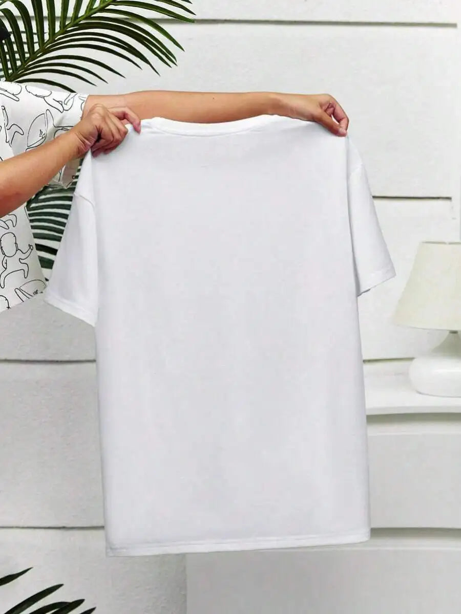 Back view of a white t-shirt being held up