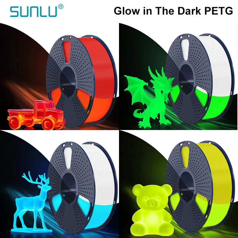 Four spools of glow in the dark 3D printing filament with various 3D printed objects next to them.