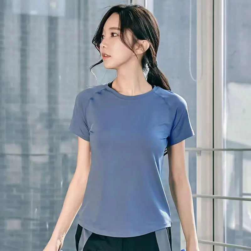 Blue short-sleeve athletic t-shirt with mesh back detail for women