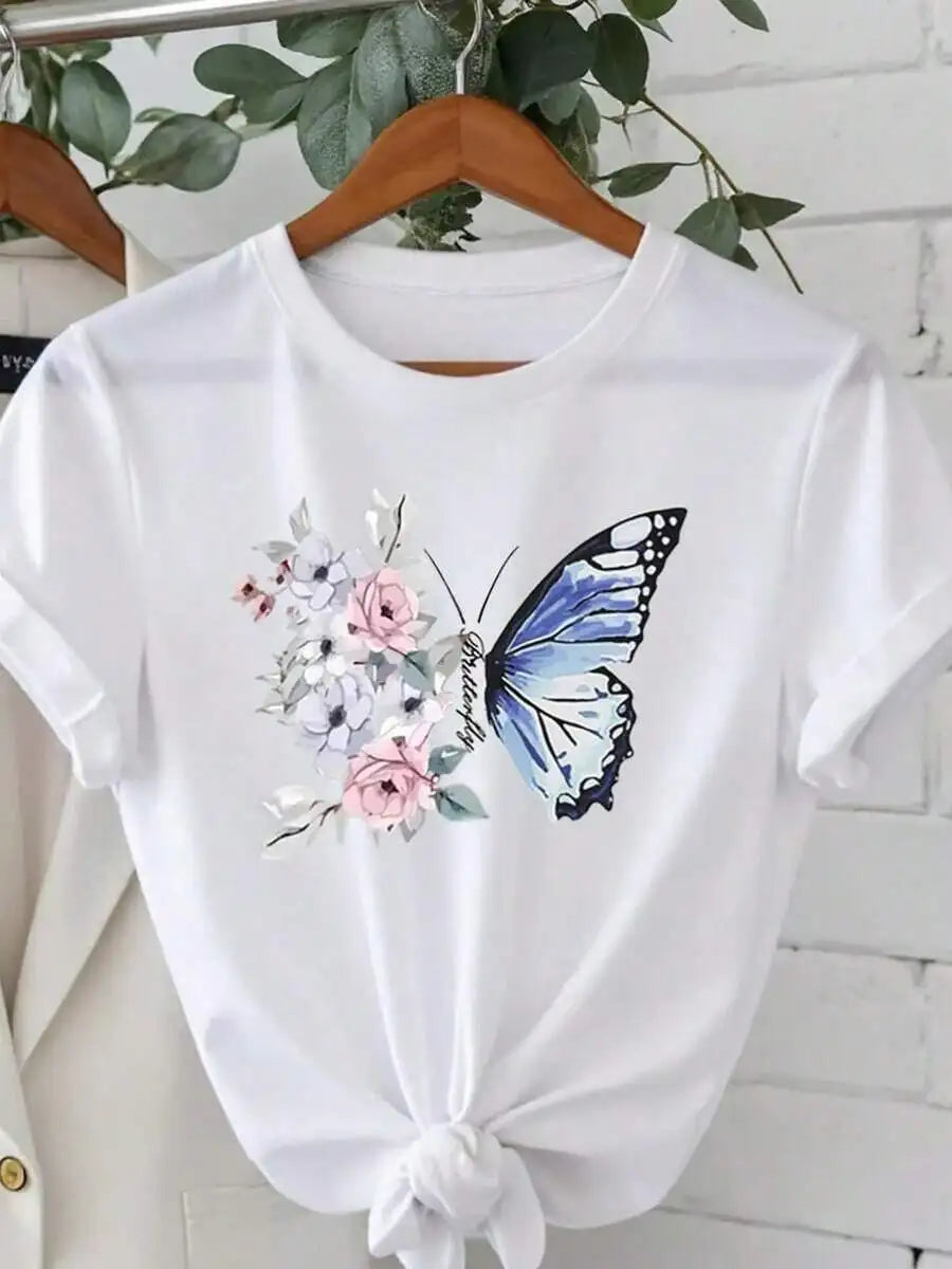 White t-shirt with floral butterfly graphic print hanging on a wooden hanger