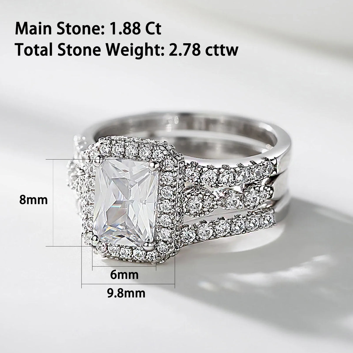 Sterling silver engagement ring set with rectangular stone and pave bands with dimension labels