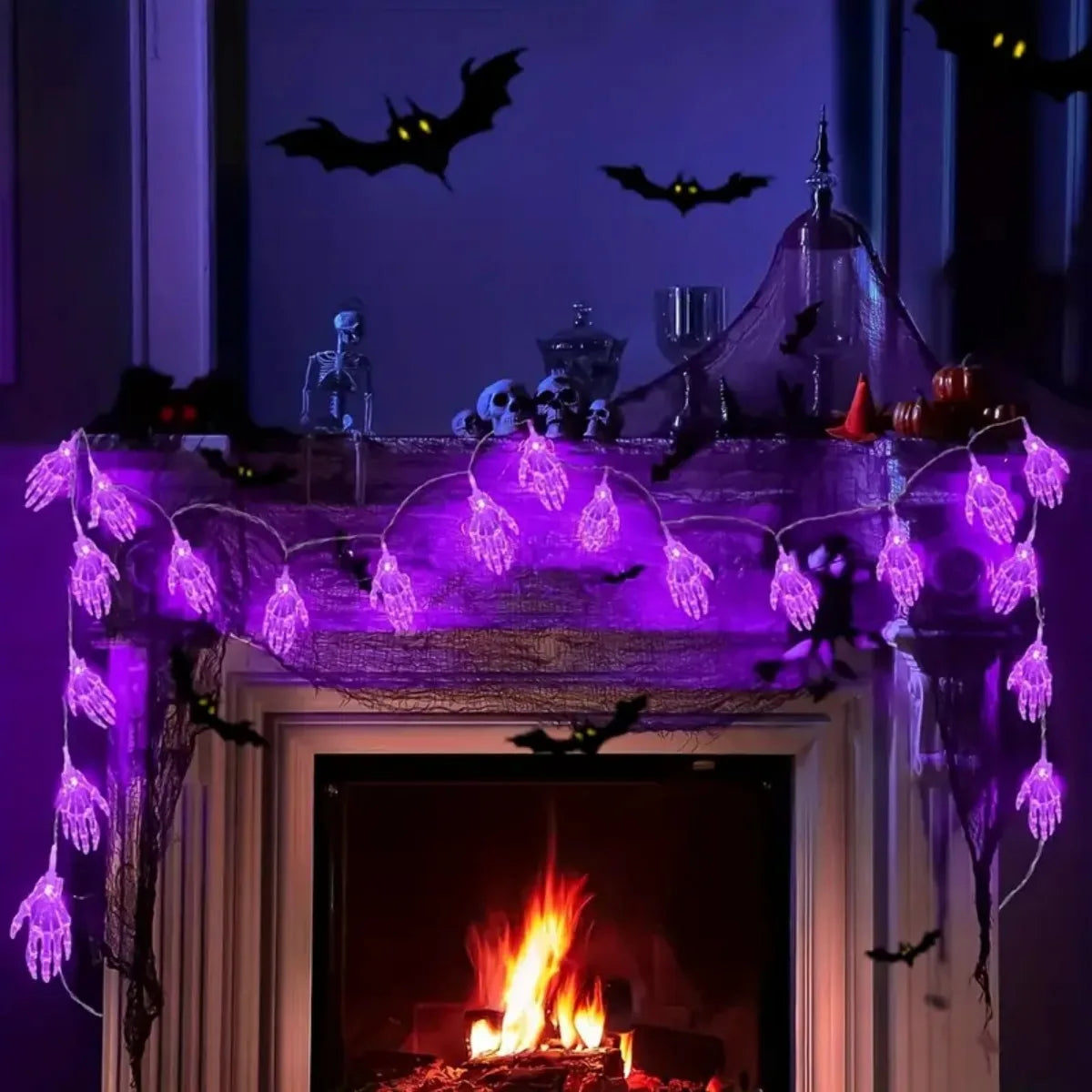 20 LED Halloween skeleton hand string light in multiple colors on a dark background – PURPLE