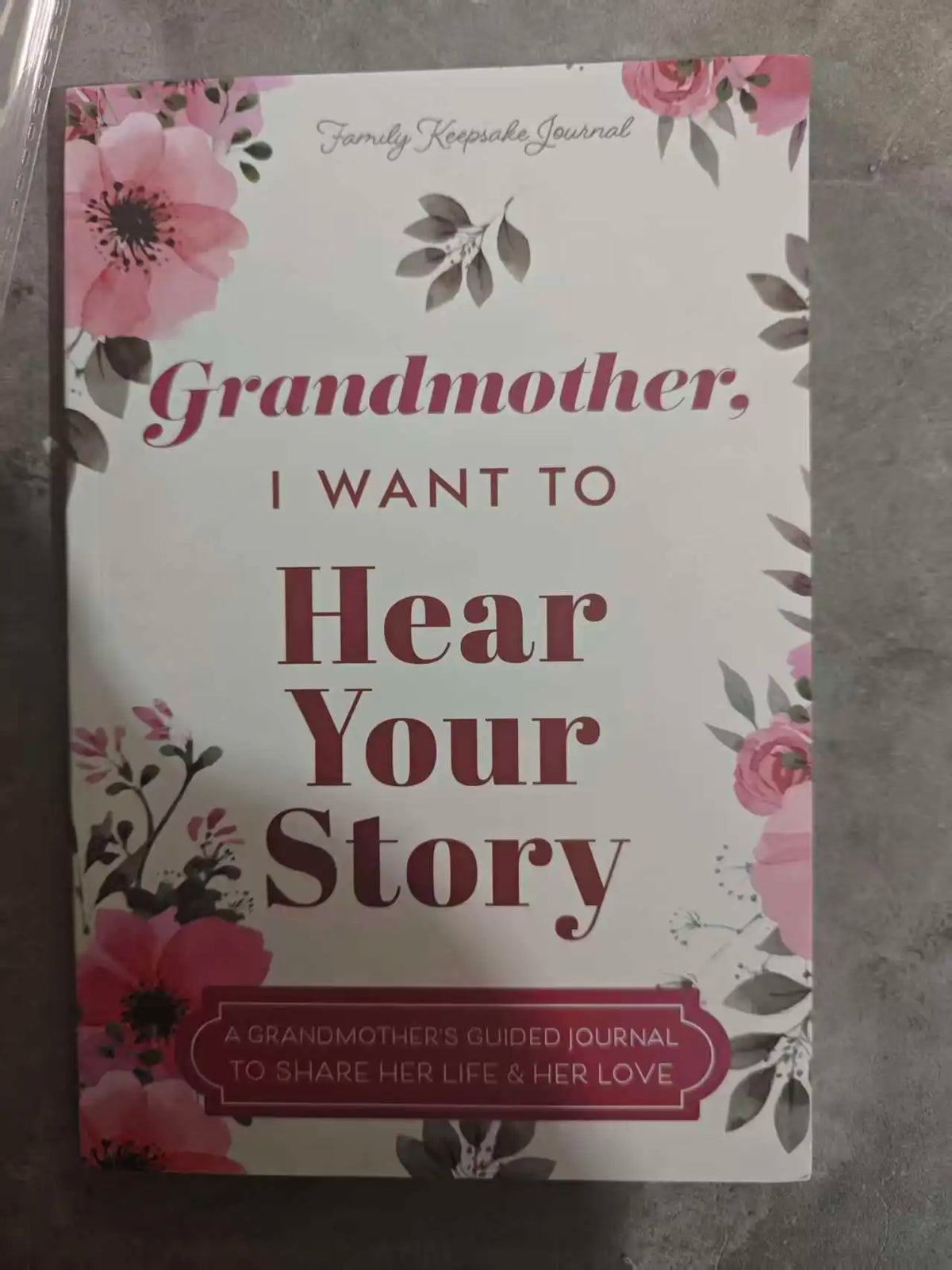 A grandmother's guided keepsake journal with a floral cover.