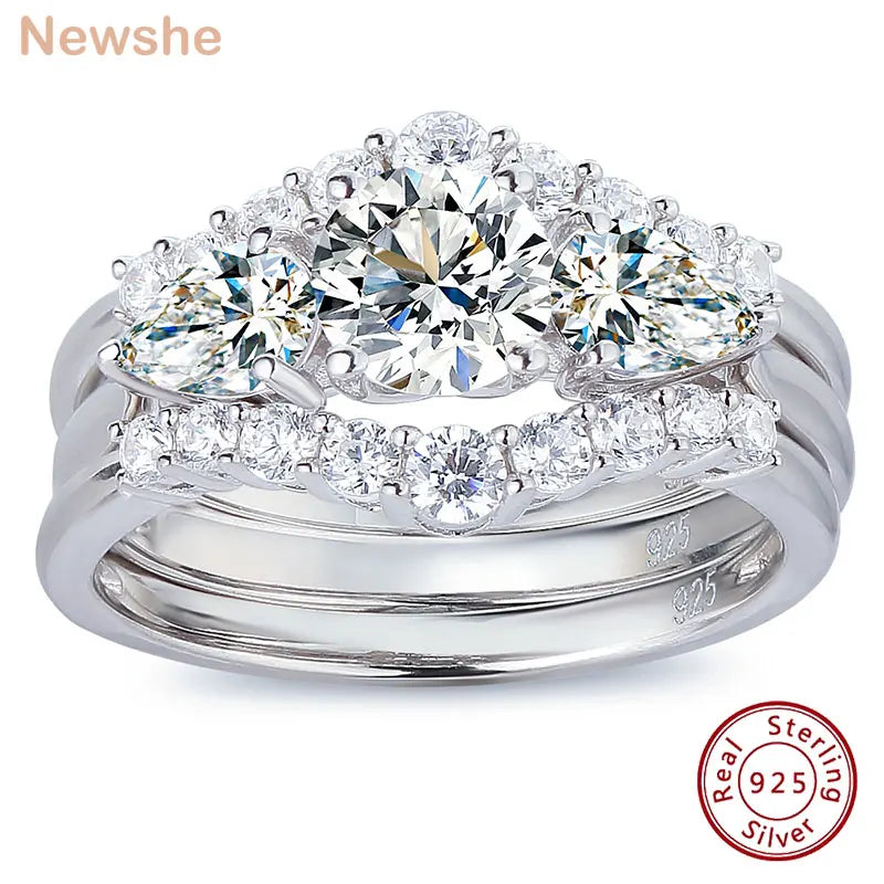 Three-piece sterling silver engagement and wedding ring set with round and pear-cut simulated diamonds