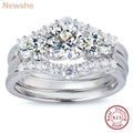 Three-piece sterling silver engagement and wedding ring set with round and pear-cut simulated diamonds