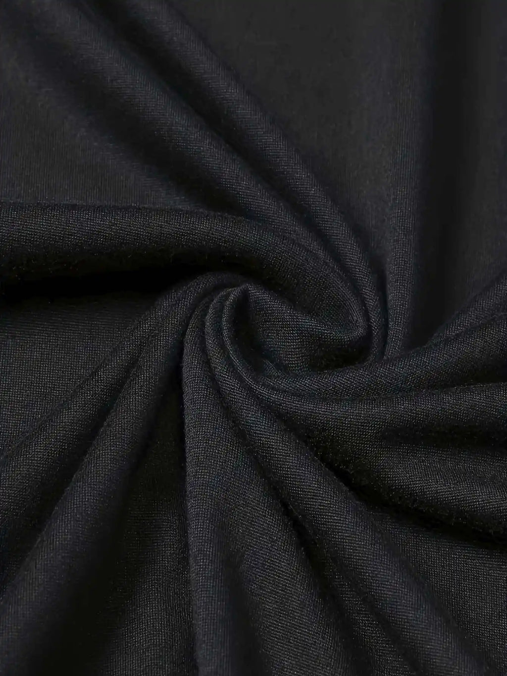 Close-up of black cotton t-shirt fabric texture