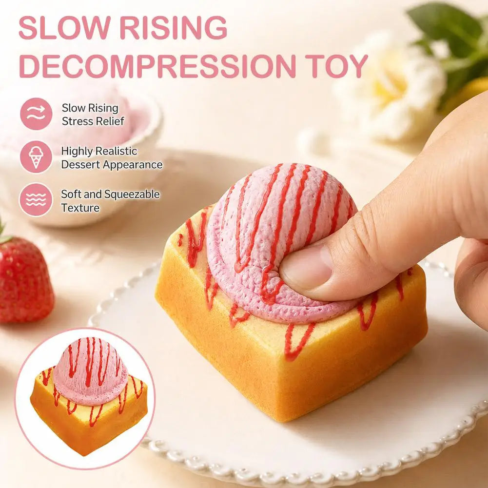 Hand squeezing a pink ice cream bread stress relief toy