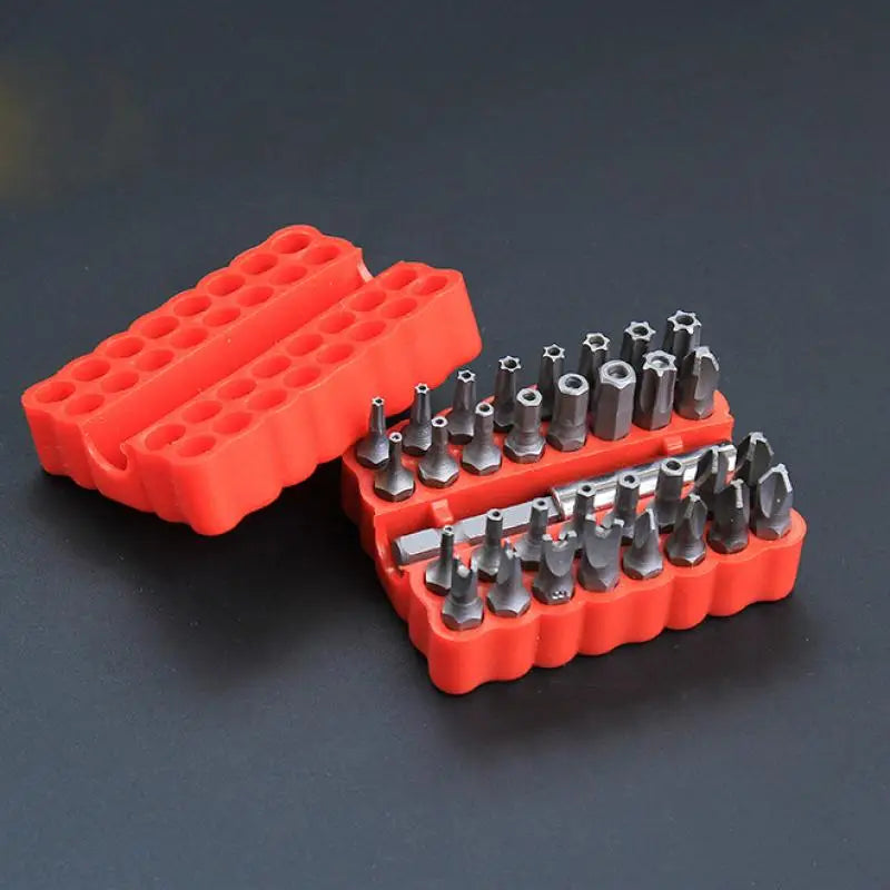 Open red storage case with 33-piece screwdriver bit set and magnetic extension