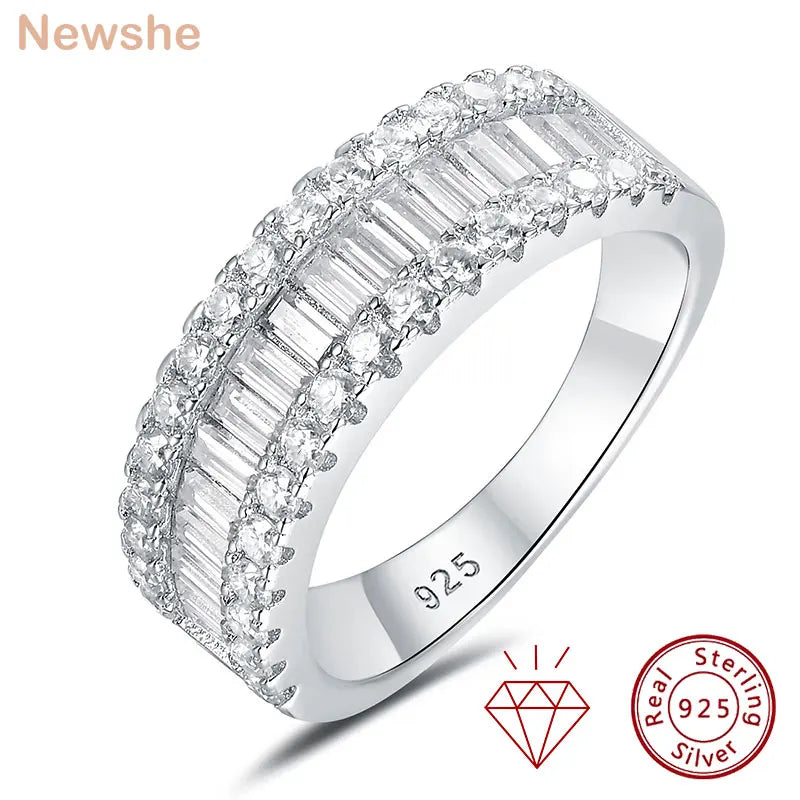 Sterling silver wedding band with baguette and round cut moissanite stones