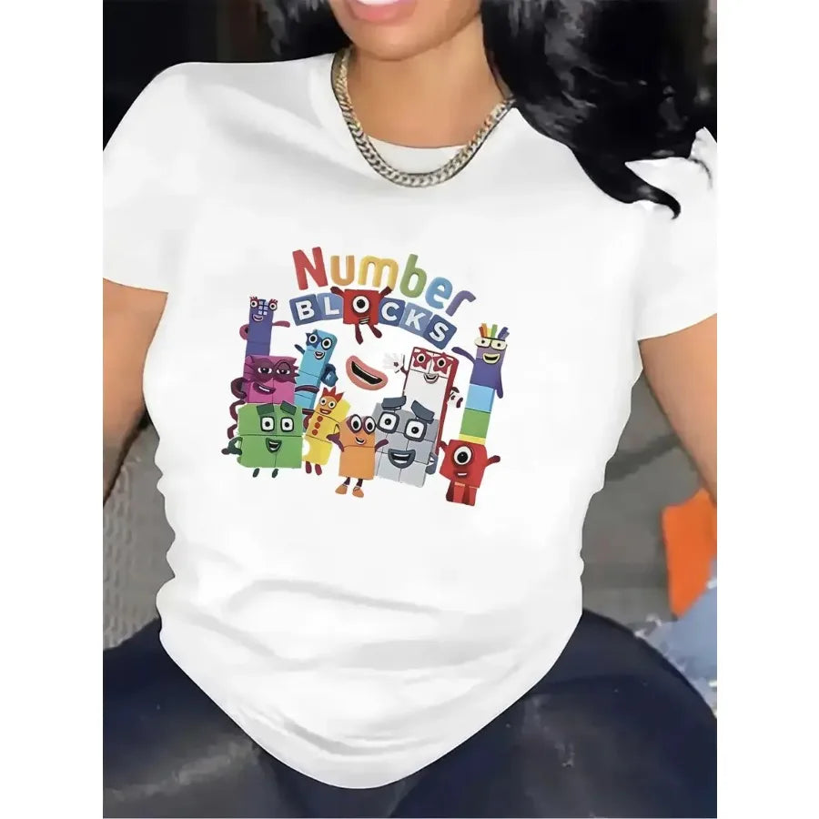 A woman wearing a white short sleeve t-shirt with a cartoon number character print.