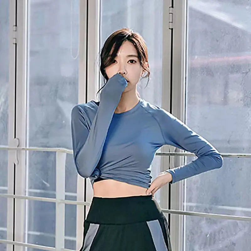 Blue long-sleeve athletic top for fitness