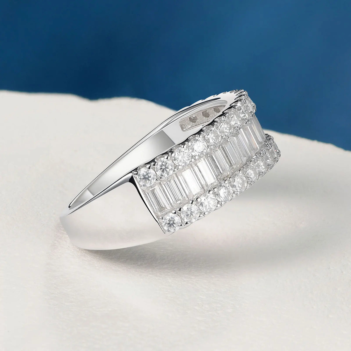 Sterling silver wedding band with baguette and round cut moissanite stones