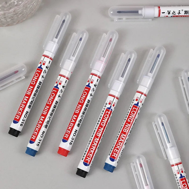 Assorted colors of long nib markers with protective caps removed, showcasing the long metal tips.