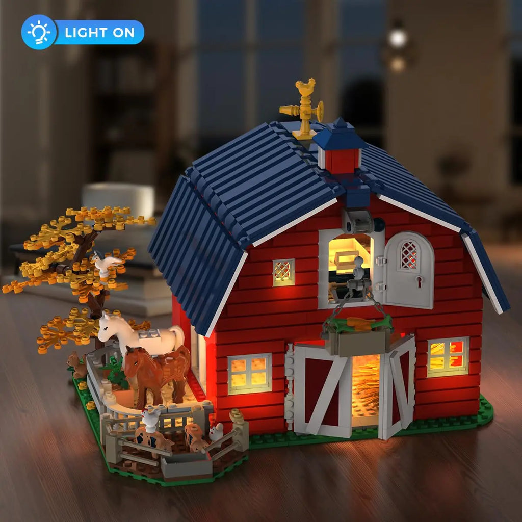 Farm barn building block set illuminated with internal LED lights at night