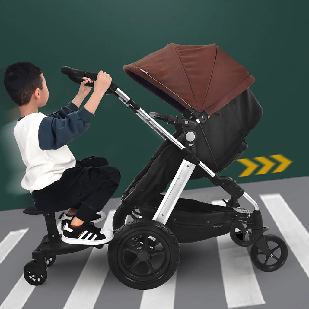 Child sitting on a universal stroller board attached to a stroller
