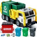 Green and white toy garbage truck with red dumpster, three recycling bins and various cardboard trash pieces