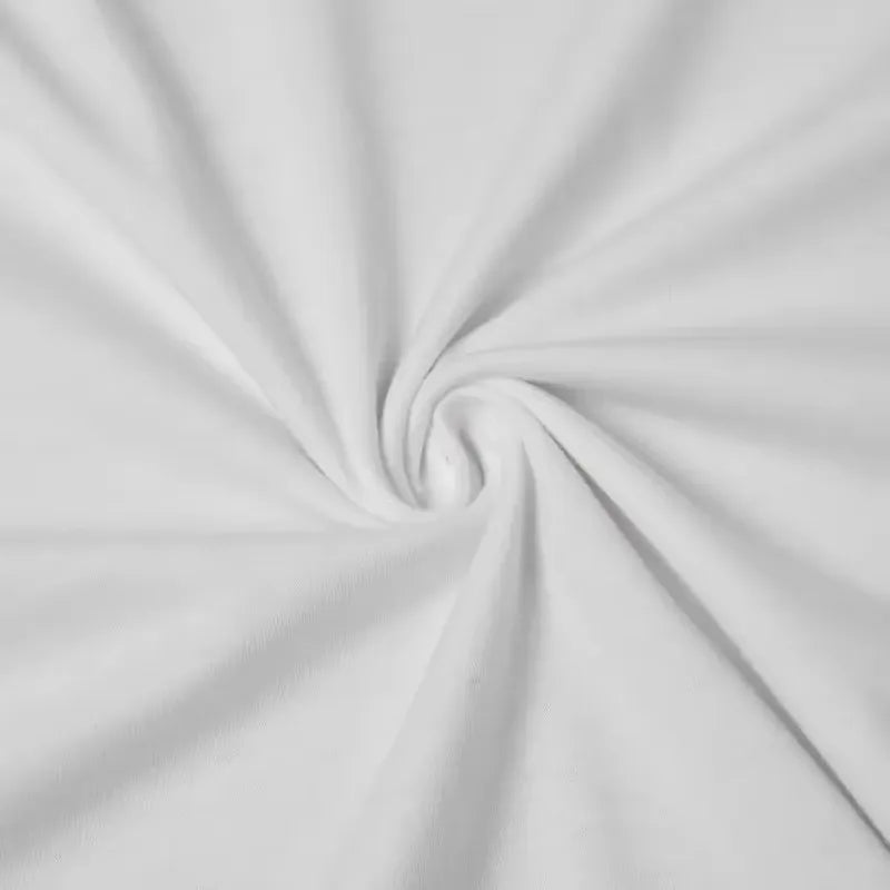 Close up of smooth white fabric swirled in the center