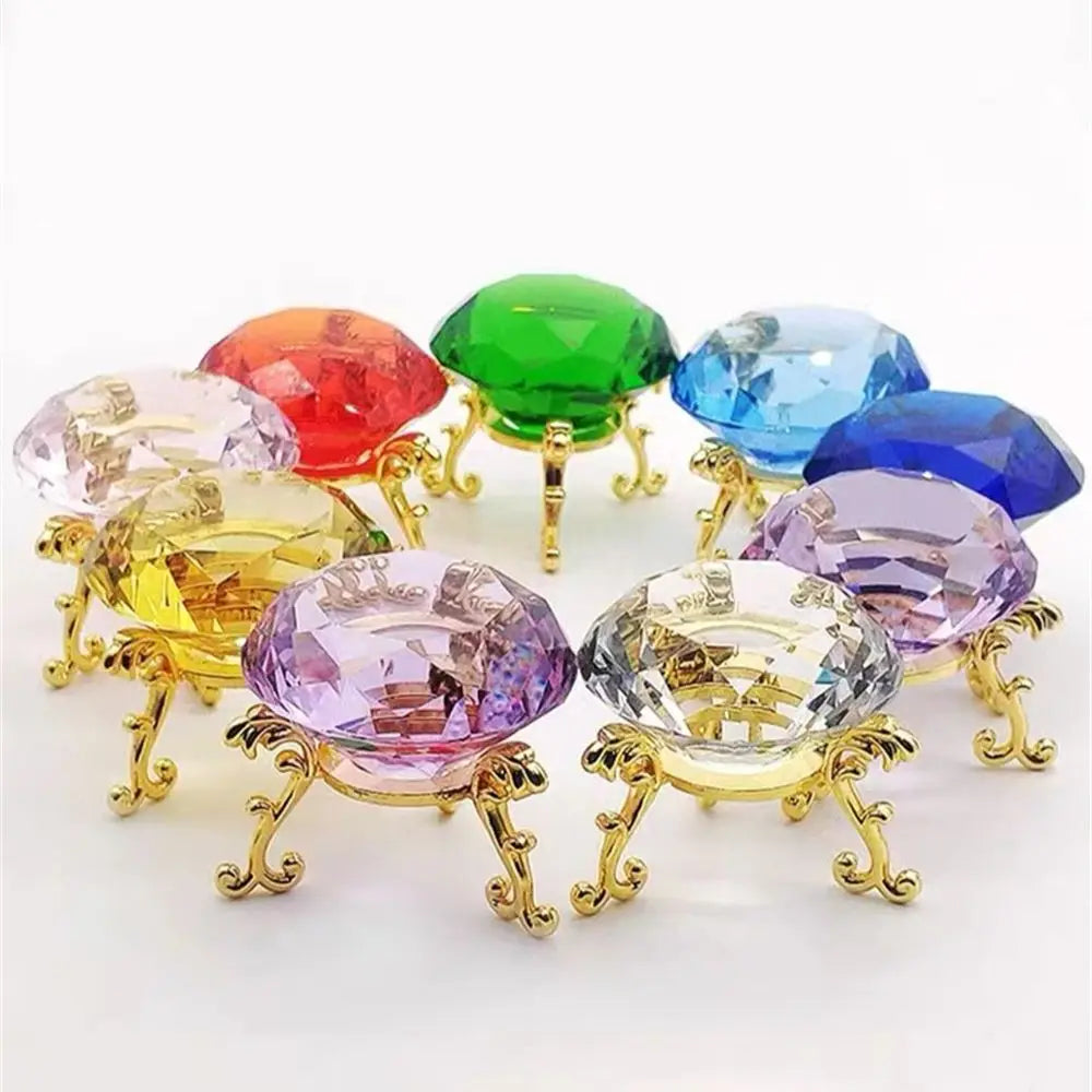 Set of multi-colored crystal diamond paperweights on gold metal stands
