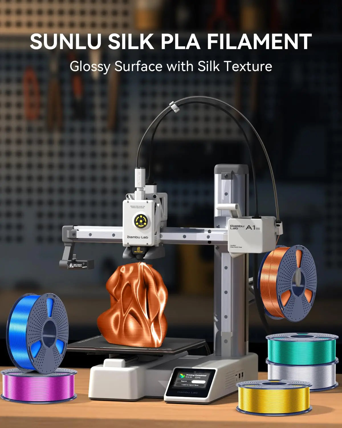 3D printer printing an abstract object, surrounded by several spools of colorful silk PLA filament.