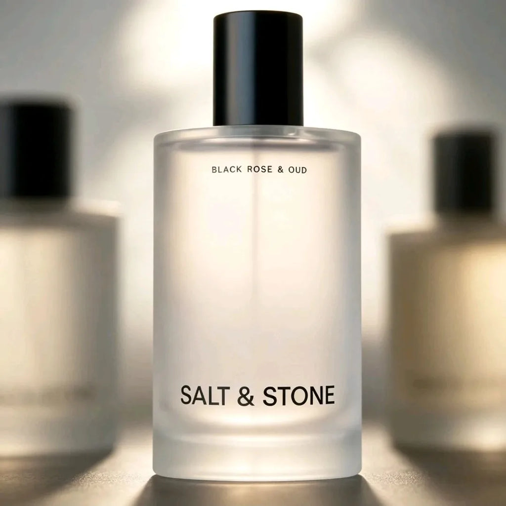 Body mist fragrance bottle with soft blurred background bottles