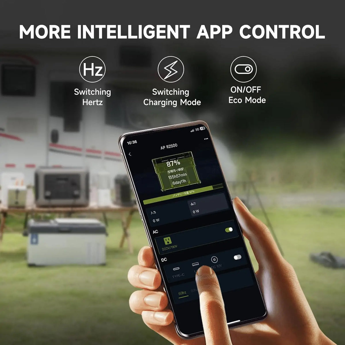 Hand holding a phone showing a power station control app