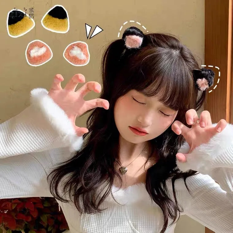 A girl wearing plush cat ear hair clips in different colors on her hair