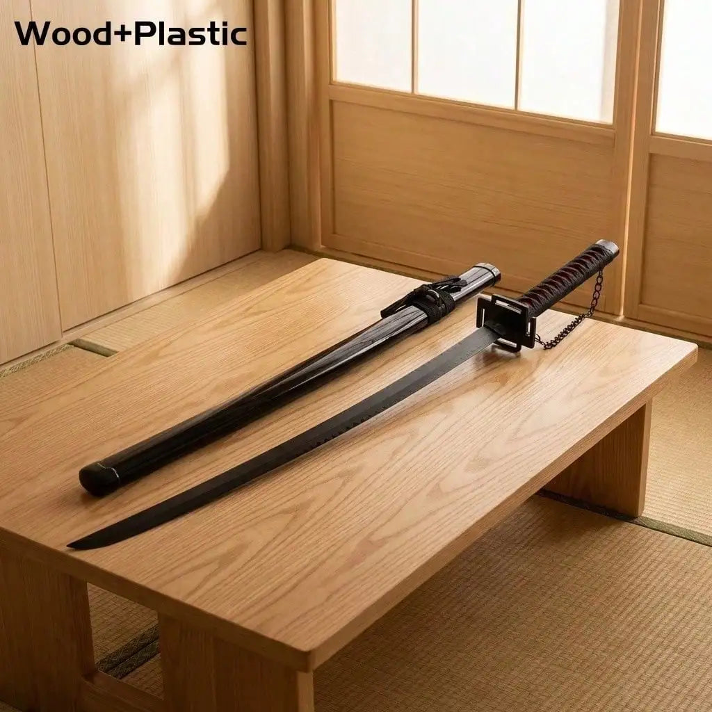 Wooden and plastic katana sword replica resting on a wooden table
