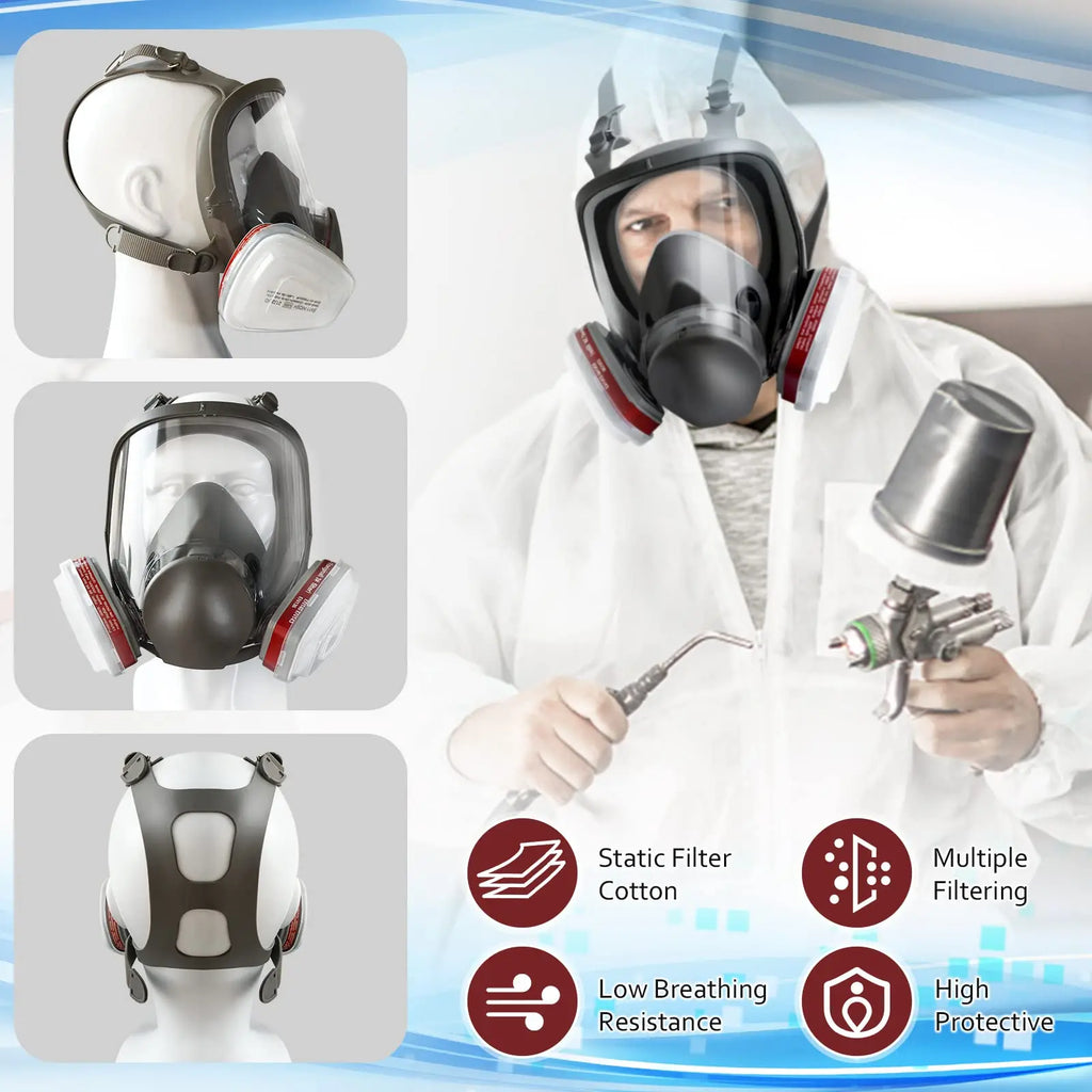 Full face respirator mask displayed on mannequin heads and worn by a person painting
