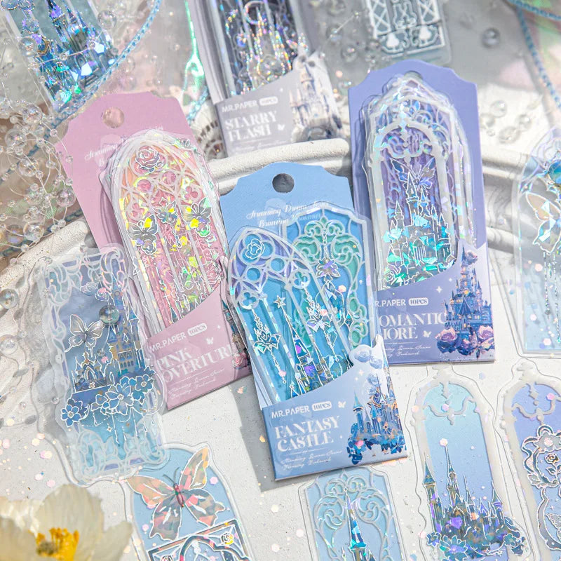 A collection of holographic fantasy-themed bookmark packs with castle and flower illustrations.