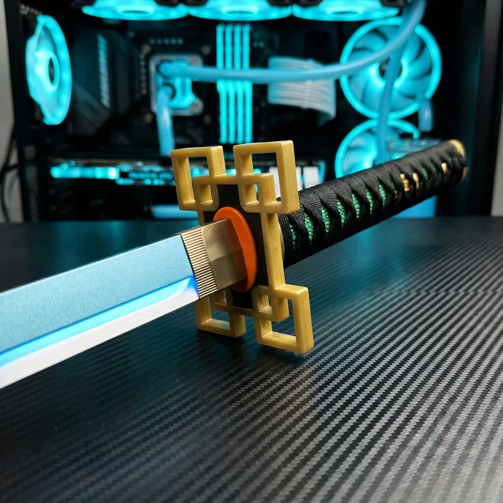 Replica katana sword with gold hilt guard and blue vapor light effect