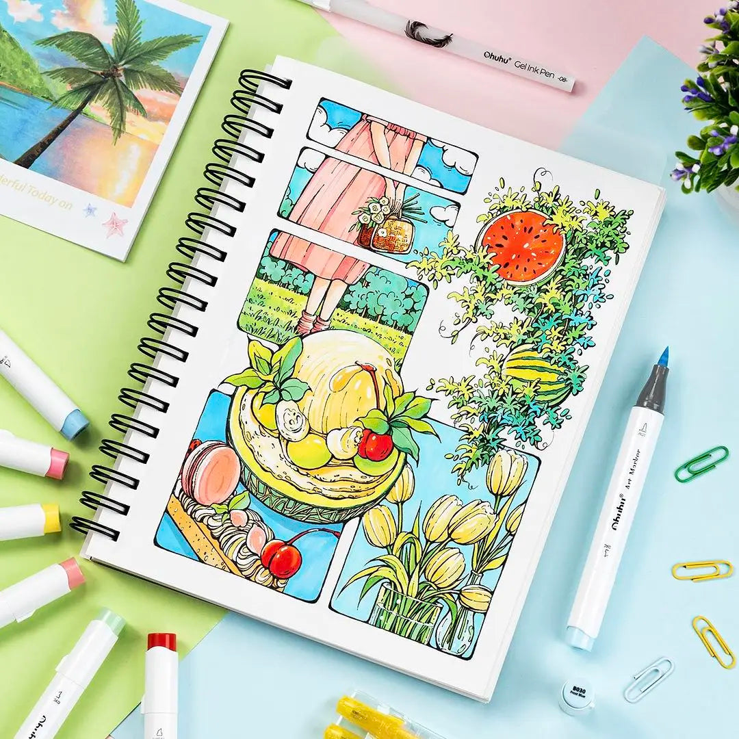Spiral bound sketchbook showing colorful illustrations colored with markers