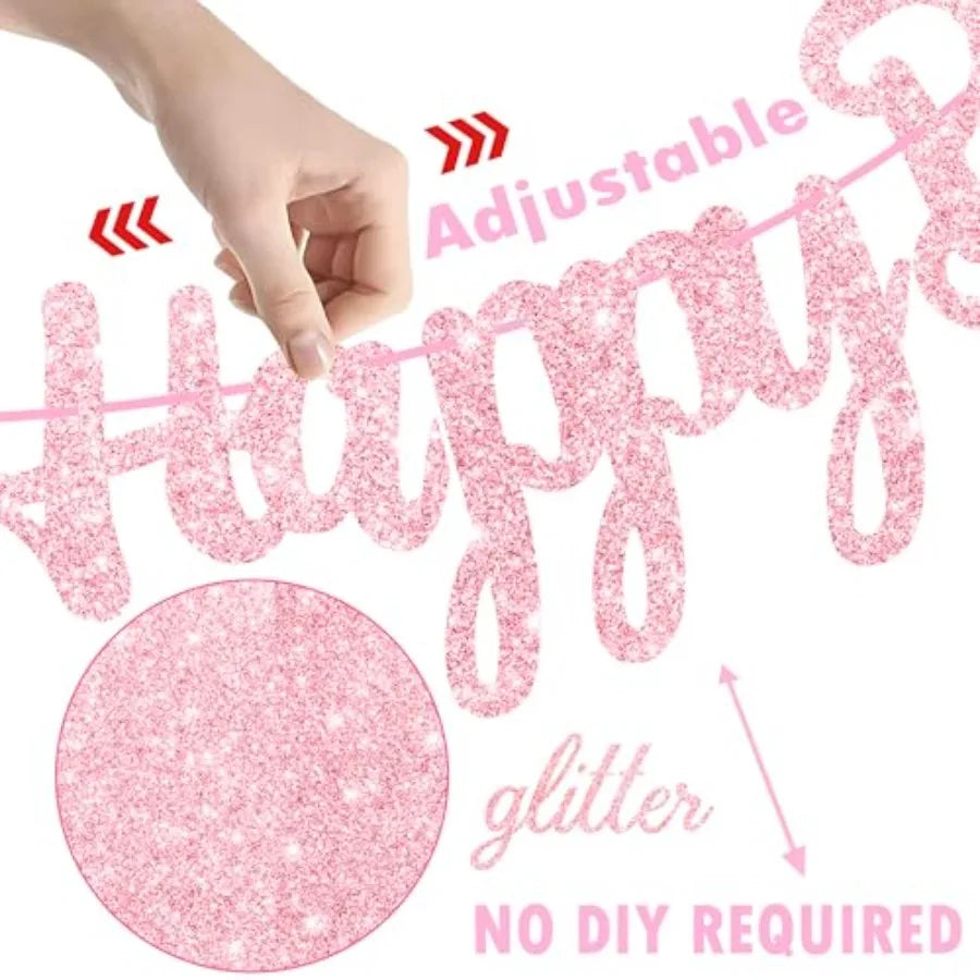 Close-up of pink glittery birthday banner pieces with instruction for assembly