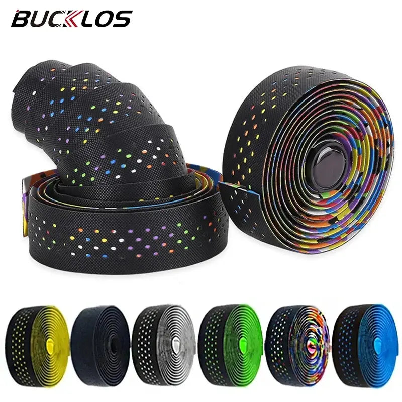 A variety of perforated road bike handlebar tapes in different colors arranged in a group