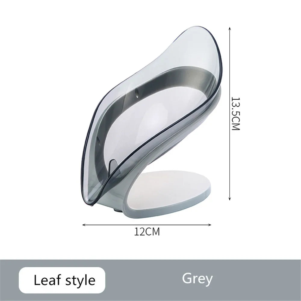 Leaf-shaped blue and grey plastic soap dish with a suction cup base – view 3