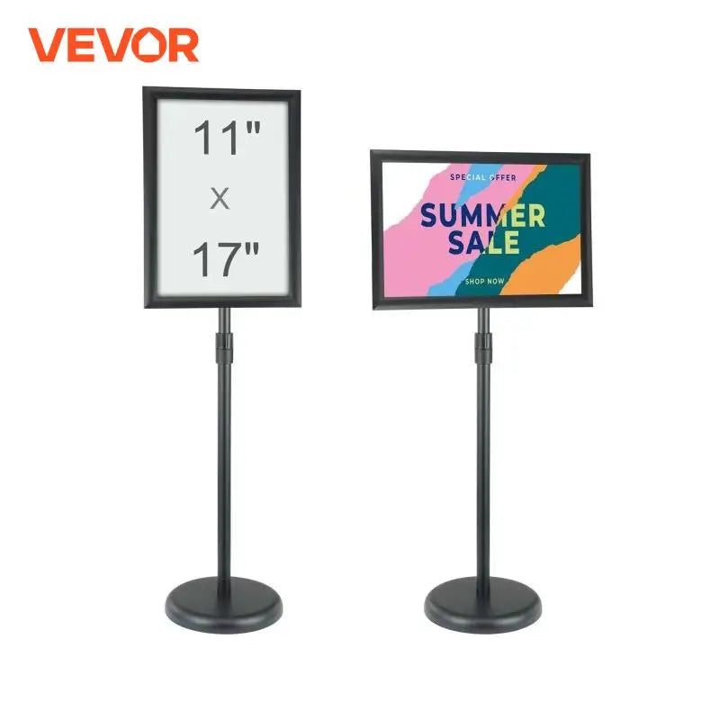 A vertical pedestal sign holder on a floor stand with an aluminum frame displaying a poster.