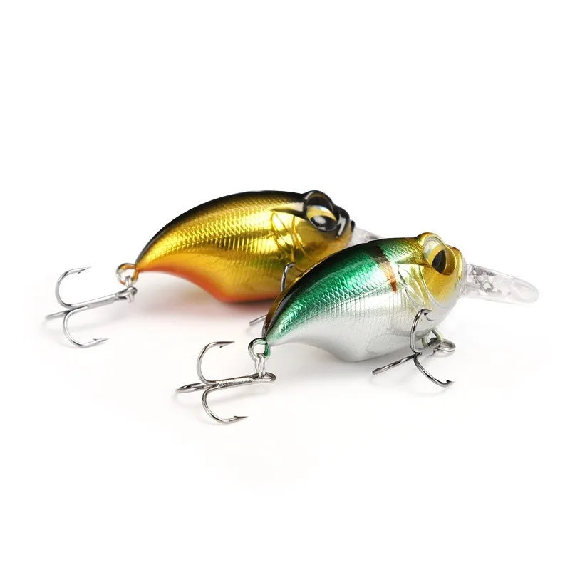 Two fishing crankbait lures in gold and green silver colors