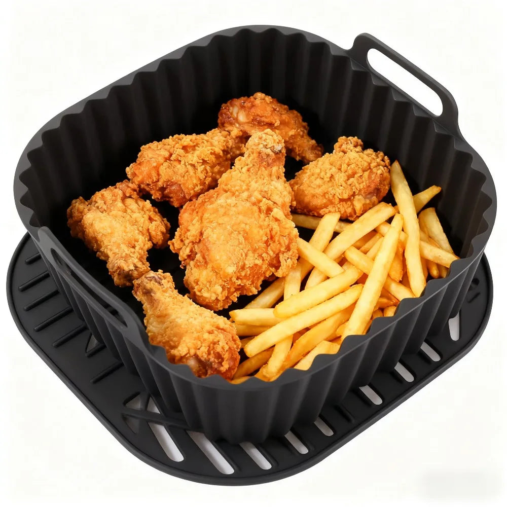 Black square silicone air fryer liner with fried chicken and french fries