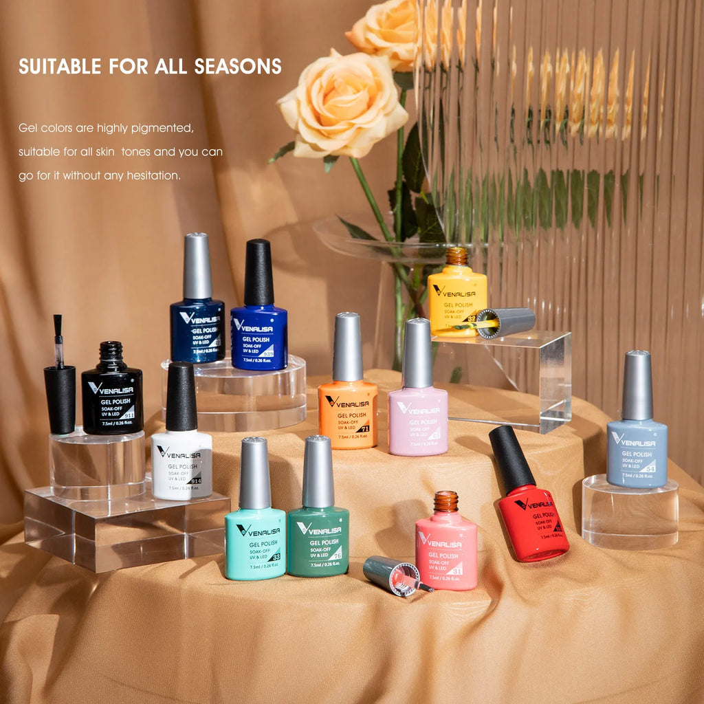 A variety of gel nail polish bottles displayed on a table with a rose decoration