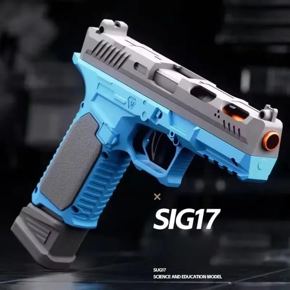 Blue and grey toy pistol with orange barrel tip on a dark background
