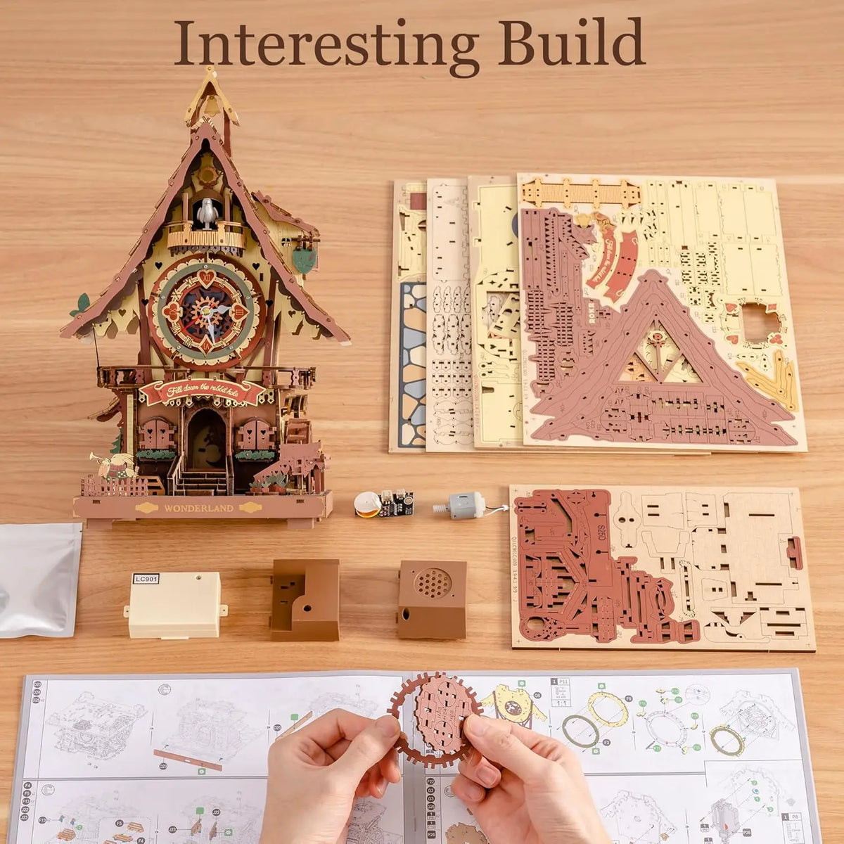 3D wooden cuckoo clock puzzle assembly kit on a wooden table