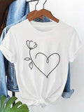 White short-sleeved t-shirt with a minimalist black heart and flower line art print