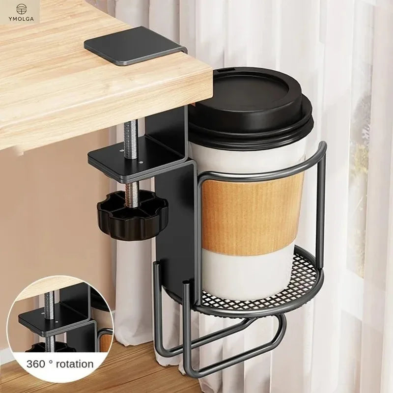 Black metal clamp-on desk cup holder with 360-degree rotation feature holding a coffee cup
