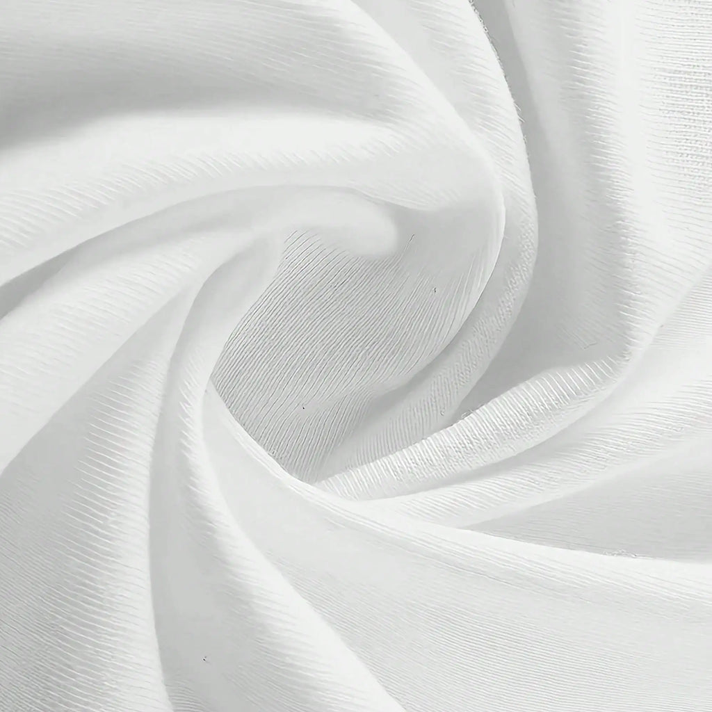 A close-up of the white t-shirt fabric showing soft folds and texture.