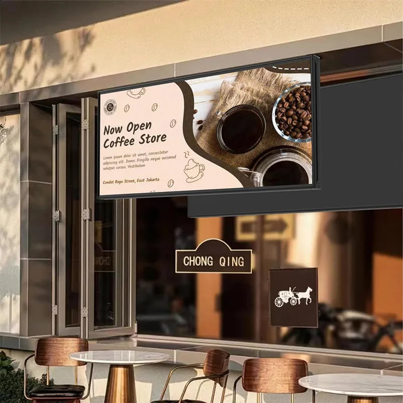 Digital LED display board showing an advertisement for a coffee shop, installed on a storefront