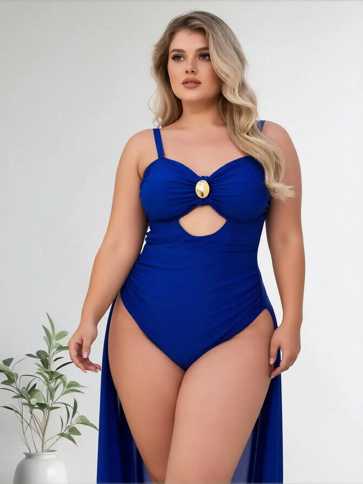 Royal blue one-piece swimsuit with cutout and gold front accent on a model