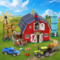 Building block set of a red farm barn with a windmill, silo, blue truck, and green tractor