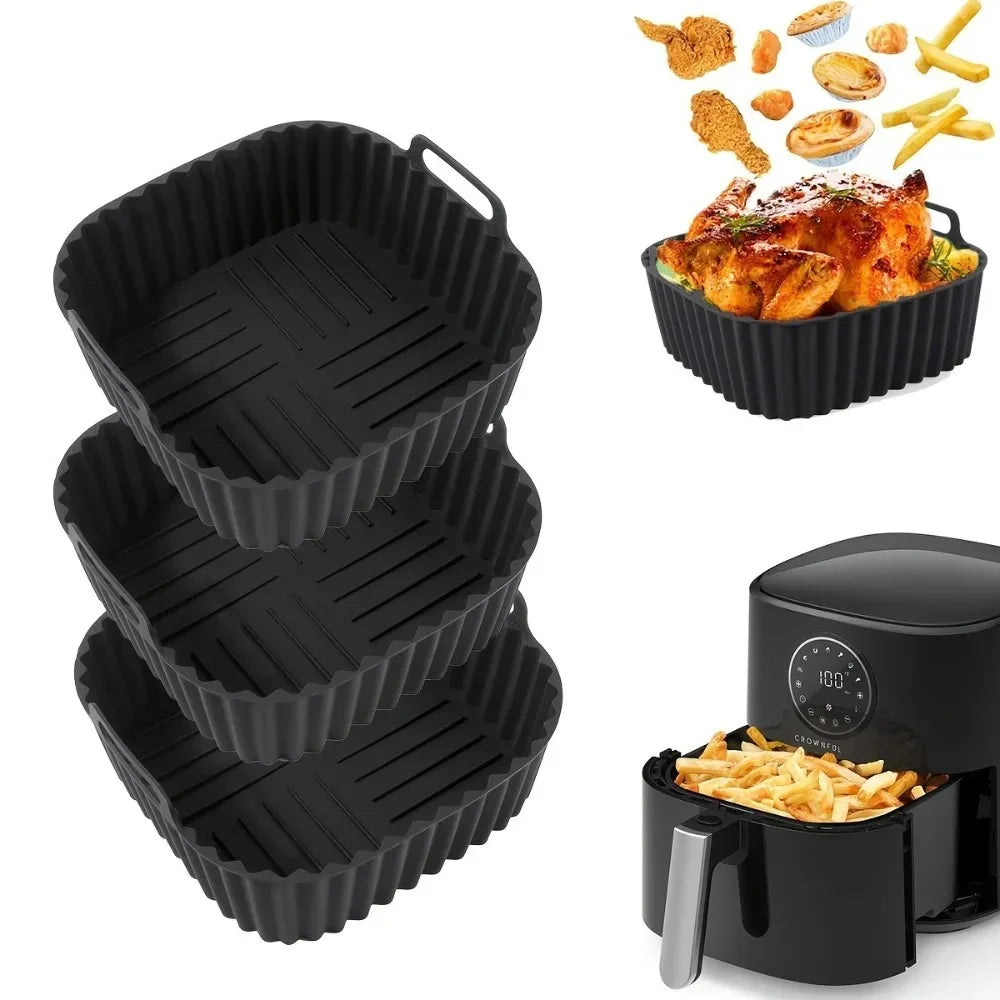 Set of three square black silicone air fryer liners with images of cooked food and an air fryer