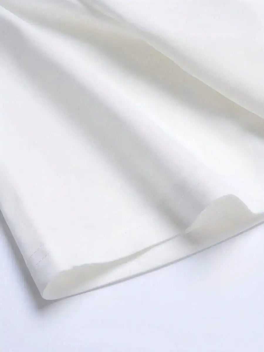 Close-up of white cotton fabric texture