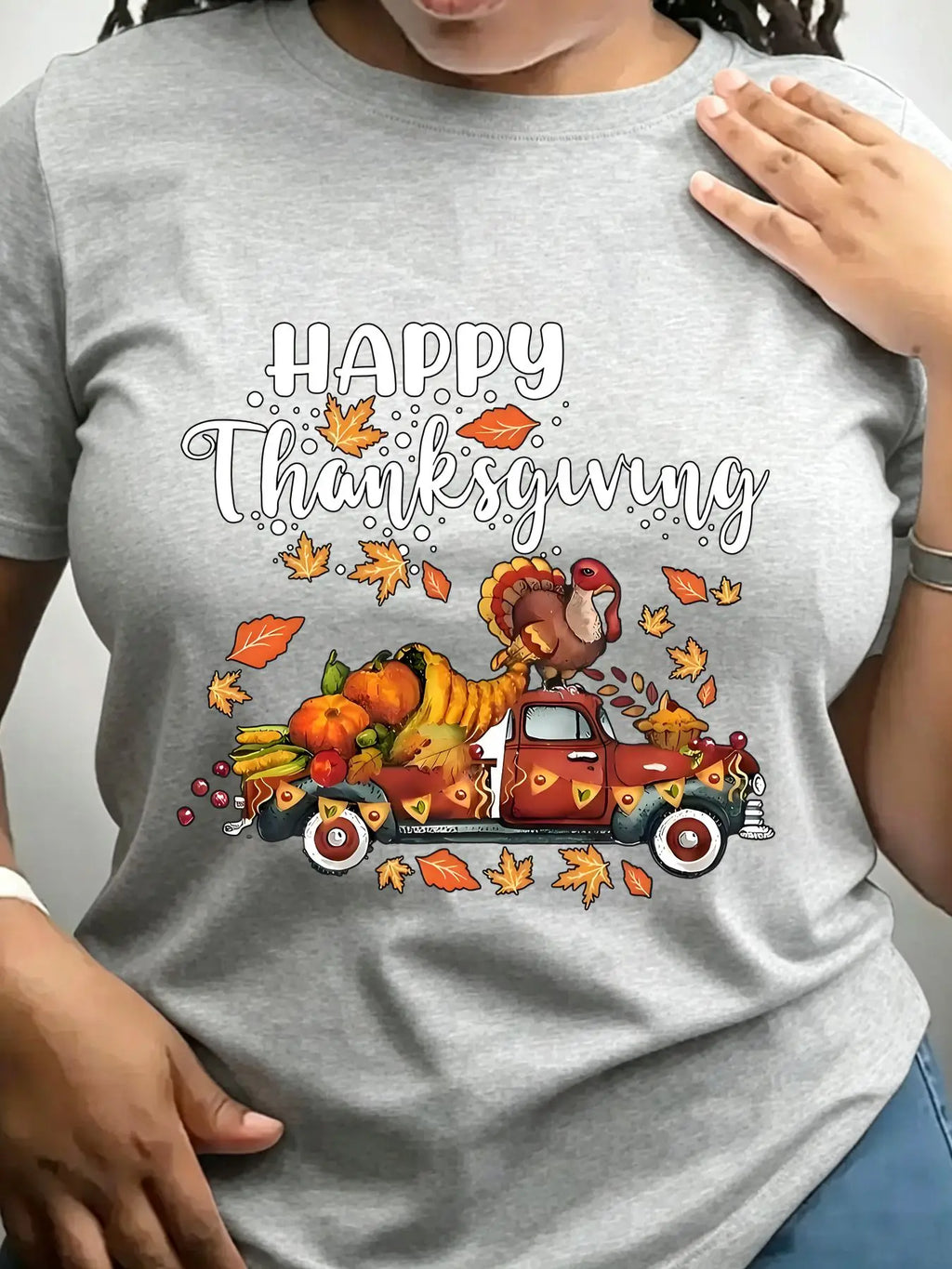 Grey crew neck t-shirt with a vintage truck carrying a turkey and autumn harvest illustration