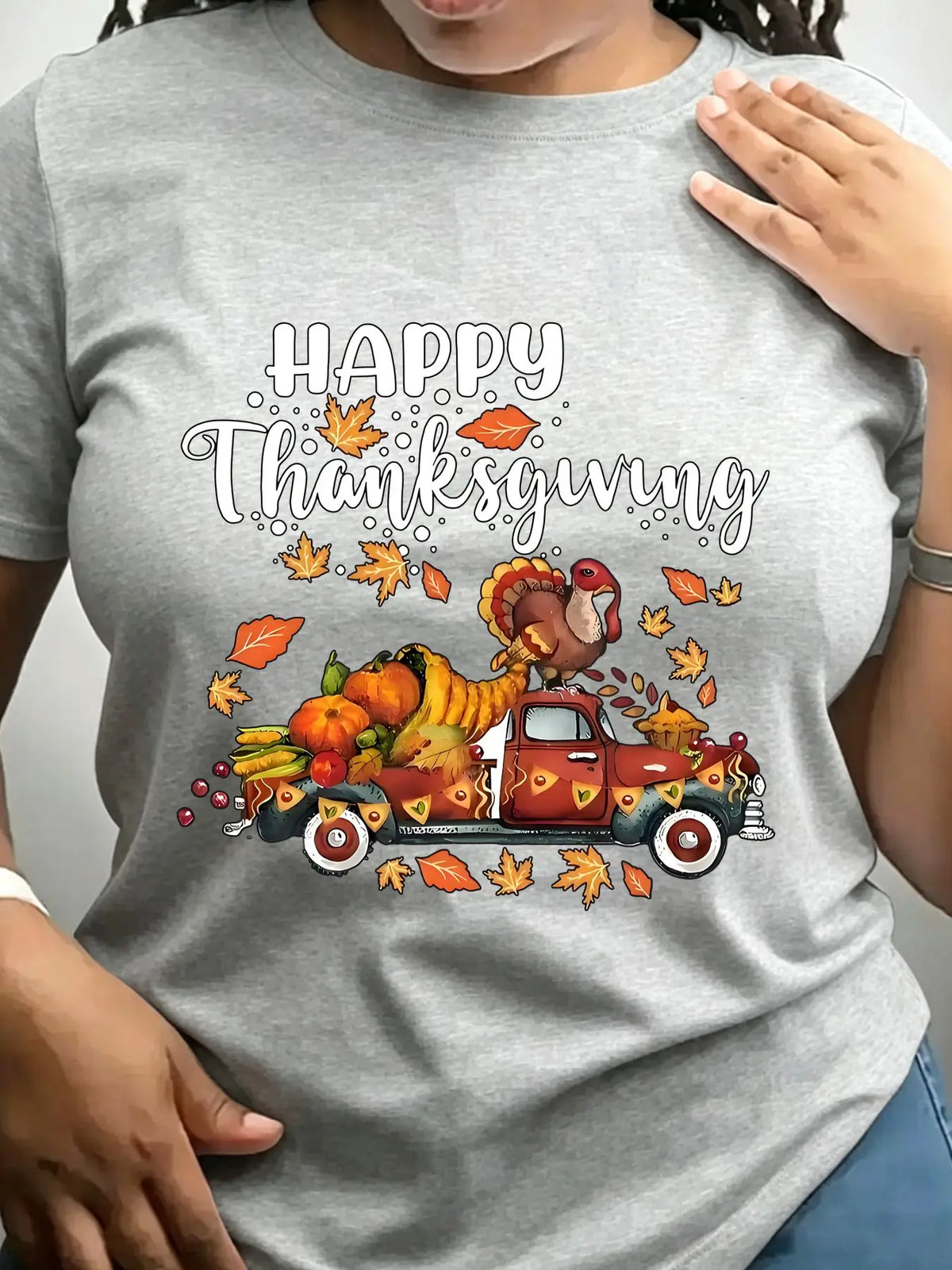 Grey crew neck t-shirt with a vintage truck carrying a turkey and autumn harvest illustration